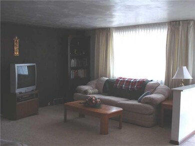 Living Room. Flooded with natural light, corner bo