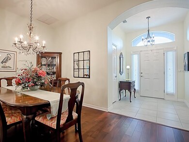 A tiled entry foyer offers a convenient coat close