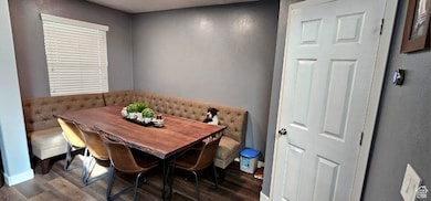 Dining room with wood finished floors