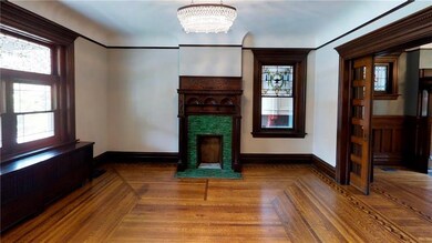 A view into the formal living room w/ original man