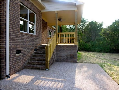 Covered porch plus grilling patio, always nice.