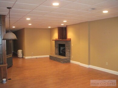 Lower Lvl Game Room: Large game room with media sc
