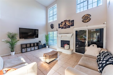 Living room with a high ceiling and a wealth of na