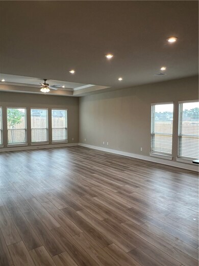 Unfurnished room featuring dark wood-style floors,