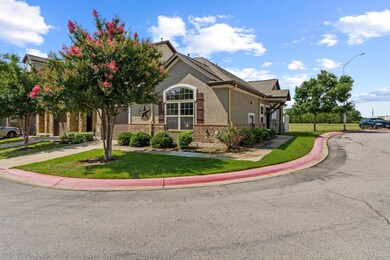 View of front of home with stucco siding and a fr