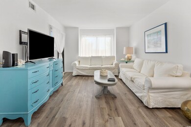 Living room featuring light hardwood / wood-style 