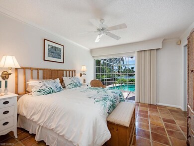 Master bedroom overlooking the pool and lake.