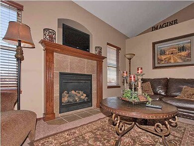 LIVING ROOM WITH PLANT SHELVES