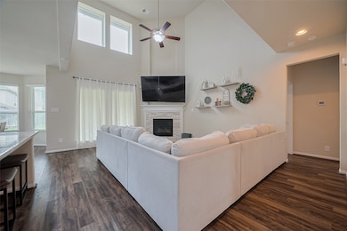 The inviting living room features sleek laminate f