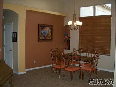 Formal dining room-note the custom paint
