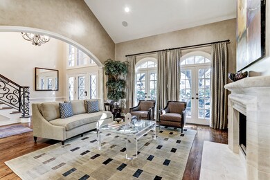 Double doors with majestic live oak & garden view.