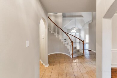 Inside you will find fresh paint throughout the entire interior, new wood laminate flooring on the first floor and a dramatic curved staircase.