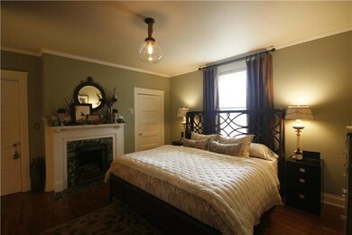 Master Bedroom with original fireplace