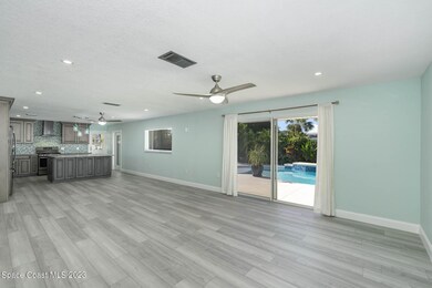 Living Room/Pool Access/Kitchen