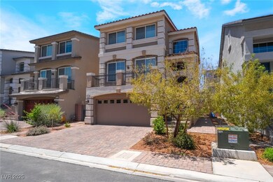 View of front of house featuring stucco siding, a