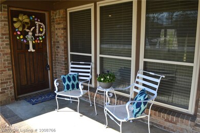 Enjoy some fresh air from the front porch sitting