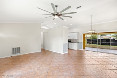 Unfurnished living room with a chandelier, ceiling