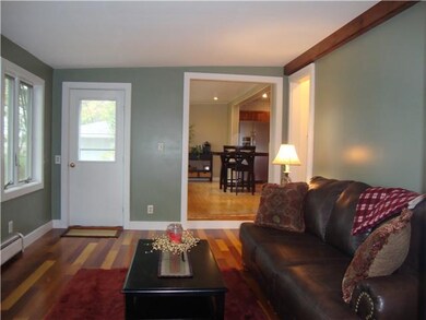 Family Room. CONVENIENT ACCESS TO DECK AND GARAGE 