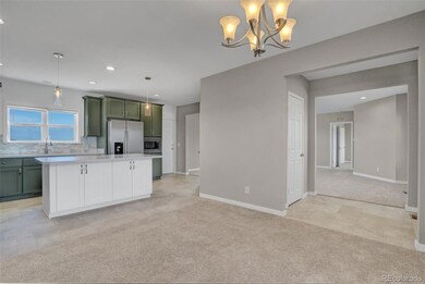 Dinning looking back at foyer and kitchen