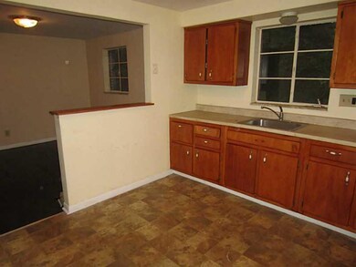 Kitchen. The Large Kitchen has New Flooring and Pa