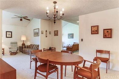 FORMAL DINING ROOM, FAMILY ROOM IN BACKGROUND