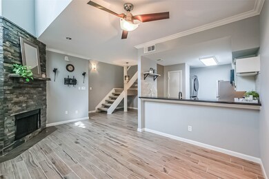 The kitchen and fireplace have both been thoughtfully updated with stylish finishes.