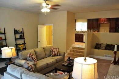 Another view of the family room shows the bonus ha
