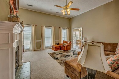 Warm, Neutral Paint, Crown Molding, Cozy Fireplace