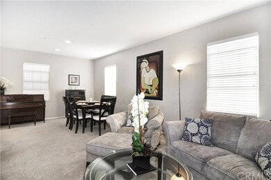Alternate view of living room showcasing dining ar