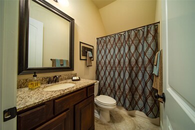 Full bath with granite countertops