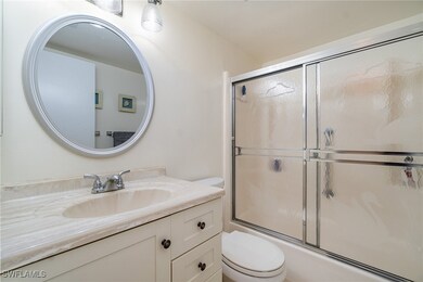 Full bathroom with vanity, shower / bath combinati