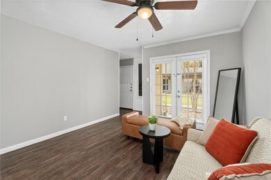 Sitting room with ceiling fan, dark hardwood / woo
