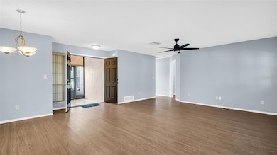 Double doors with a screen porch let in the breeze