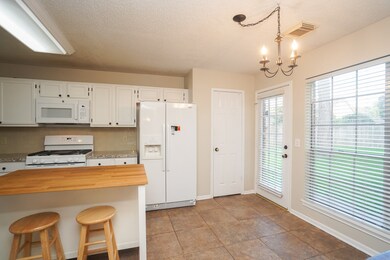 7811 Hidden Oaks Ln, Houston, TX 77095 - photo 6