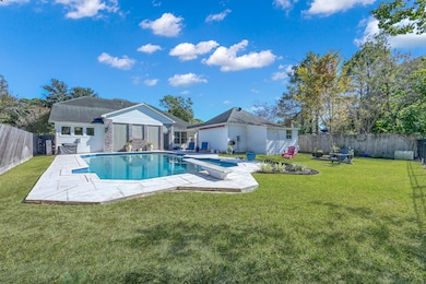 This backyard oasis offers the perfect blend of relaxation and entertainment with a sparkling pool, spa, and diving board. Surrounded by a spacious patio and lush green lawn, there’s plenty of room for lounging, outdoor dining, or play. Mature trees and thoughtful landscaping create a private, resort-style atmosphere ideal for enjoying sunny Texas days.