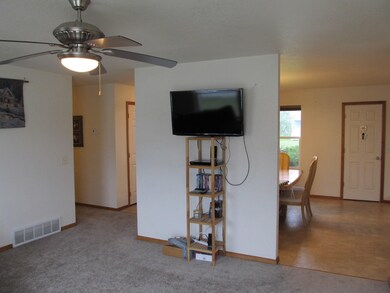 Living Room into the Dining Area.