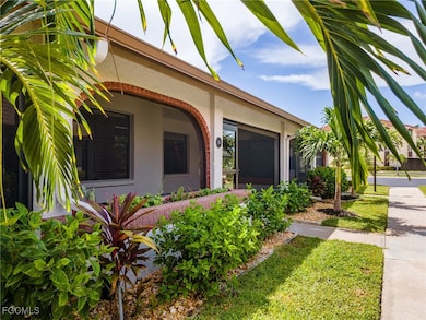 View of side of home with stucco siding
