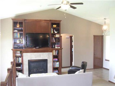 Vaulted Ceiling in Living Room w/ Ceiling Fan + Ga