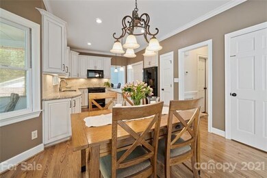 Breakfast nook with bay window adds functionality 