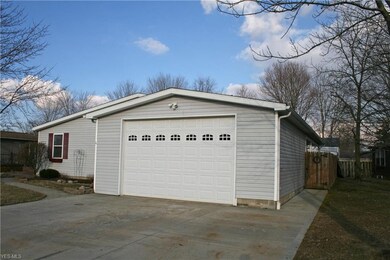 Over-sized 2-car garage with 9 x 14 door is heated