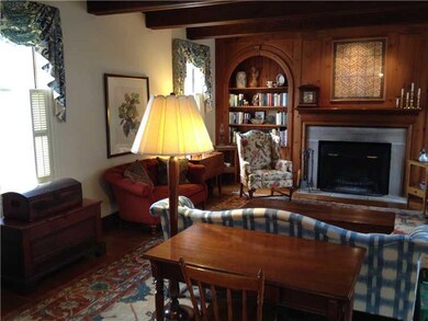 Living Room. Beamed ceiling, fireplace, built-ins,