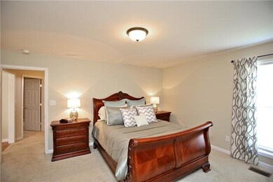 Large master bedroom with private bath.