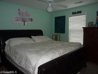 Master Bedroom. Large enough for this king size bed and other furnishings.