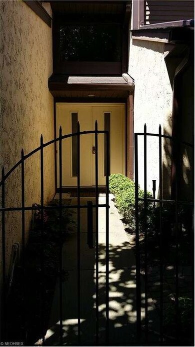Private front walk way leading to the front door.