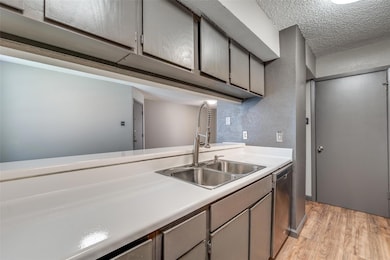 Kitchen with epoxy countertops, stainless steel ap