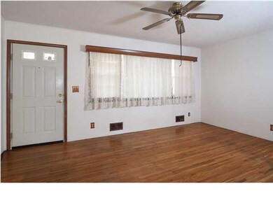 Hardwood flooring on the main level living area.