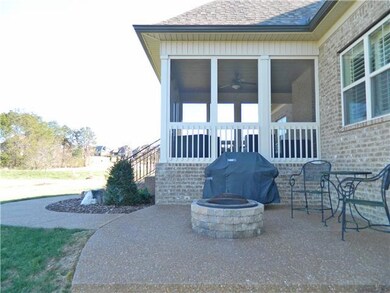 Screened Porch and open patio area with firepit