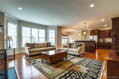 Bright, open family room with gas fireplace.