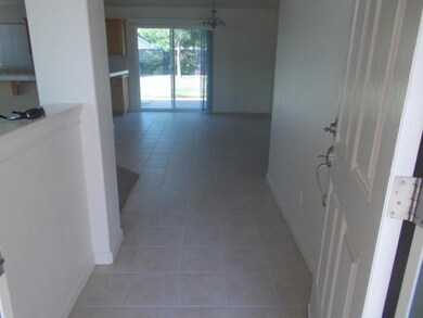 Tile entry with tile thru to the kitchen
