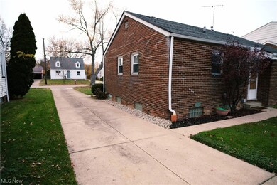 View of home's exterior featuring a yard